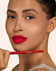 Model wearing LipSense Long-Lasting Lip Liner Pencil product shade Cherry Blaze.