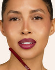 Model wearing LipSense Long-Lasting Lip Liner Pencil product shade Cherry Blaze.