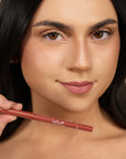 Model wearing LipSense Long-Lasting Lip Liner Pencil product shade Mauve Blush.