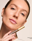 Model wearing Contouring Bronzer Cream product shade Heather Haze