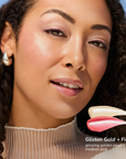 Model wearing Pearlizer Highlighter product shade Glisten Gold