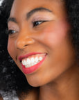 Model wearing ShadowSense product shade Dusk Shimmer