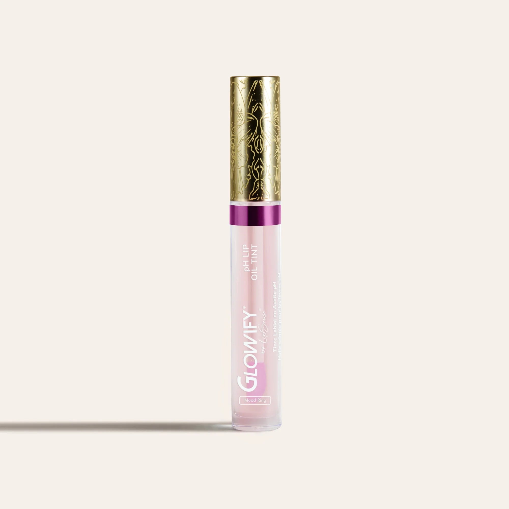 Glowify pH Lip Oil Tint MX in soft pink shade with ornate gold cap