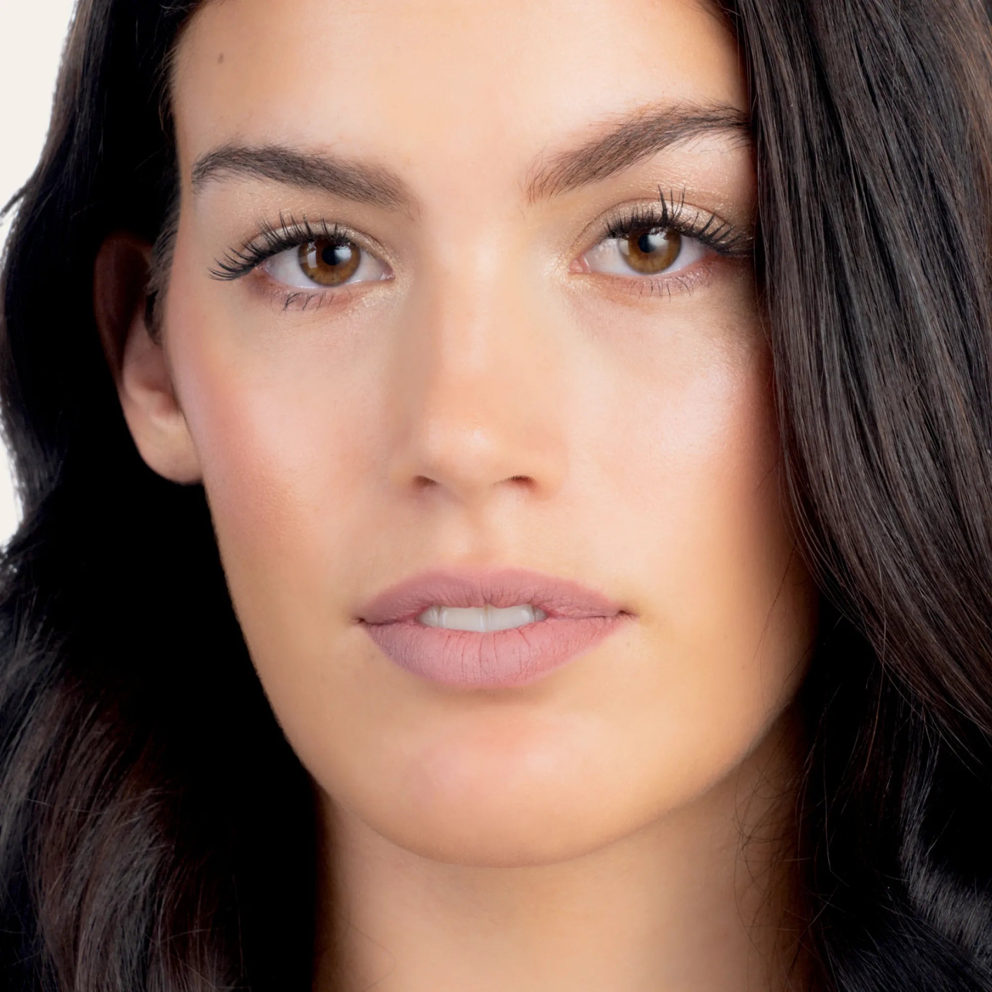 Model wearing LipSense Cream product shade Milk Rose.