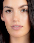 Model wearing LipSense Cream product shade Milk Rose.