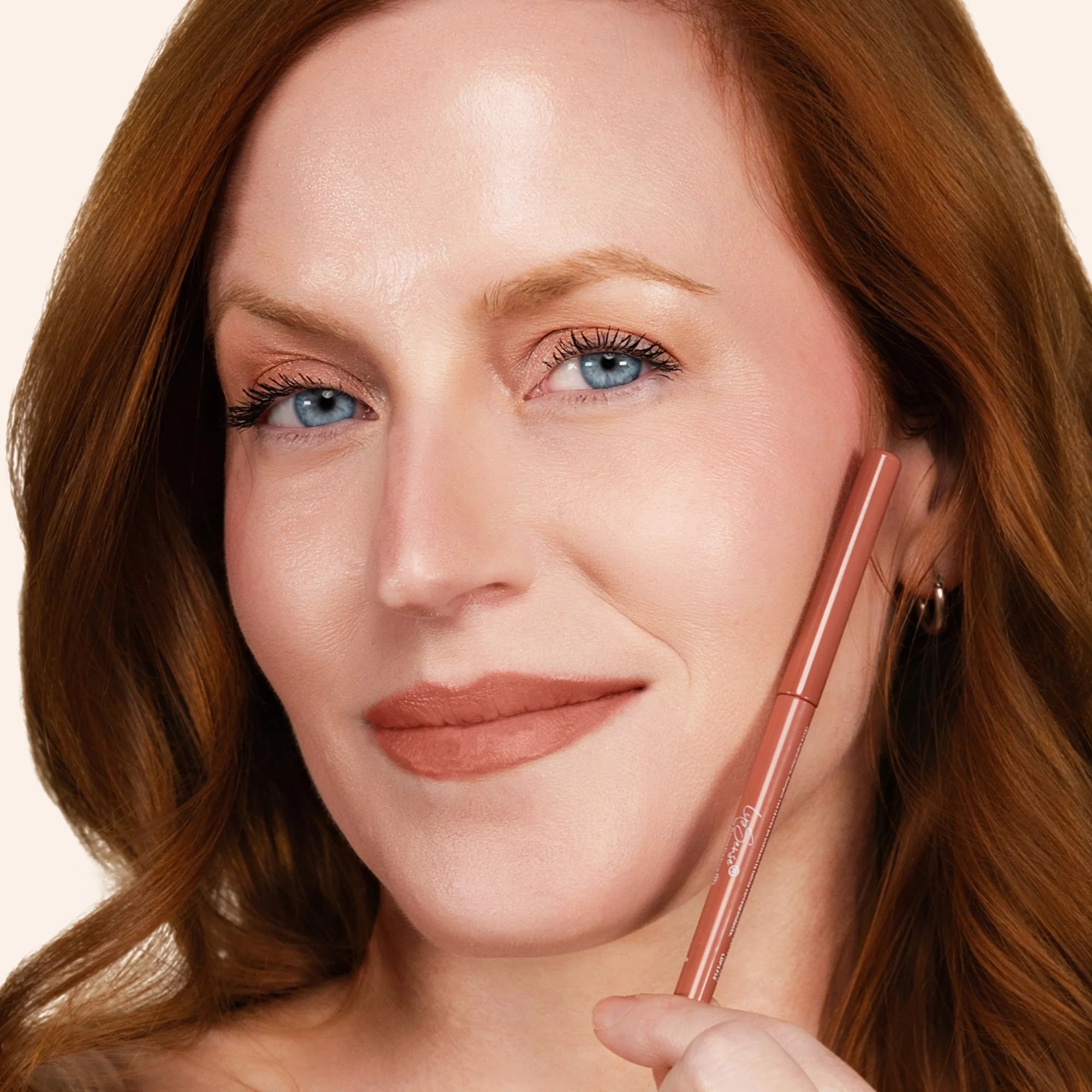 Model wearing LipSense Long-Lasting Lip Liner Pencil product shade Nude.