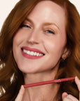 Model wearing LipSense Long-Lasting Lip Liner Pencil product shade Pink Petal.