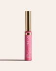 LipSense HydraMatte pink lip color bottle with a tall gold cap on a light beige background