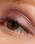 Close-up of eye wearing smoky mauve taupe shimmer from Ethereal ShadowSense Eyeshadow Duo CN, with curled lashes.