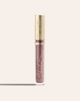 ShadowSense Eyeshadow NZL in a tall clear tube with purple glittery formula and an ornate gold cap