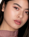 Model wearing LipSense Lip Color shade Bella
