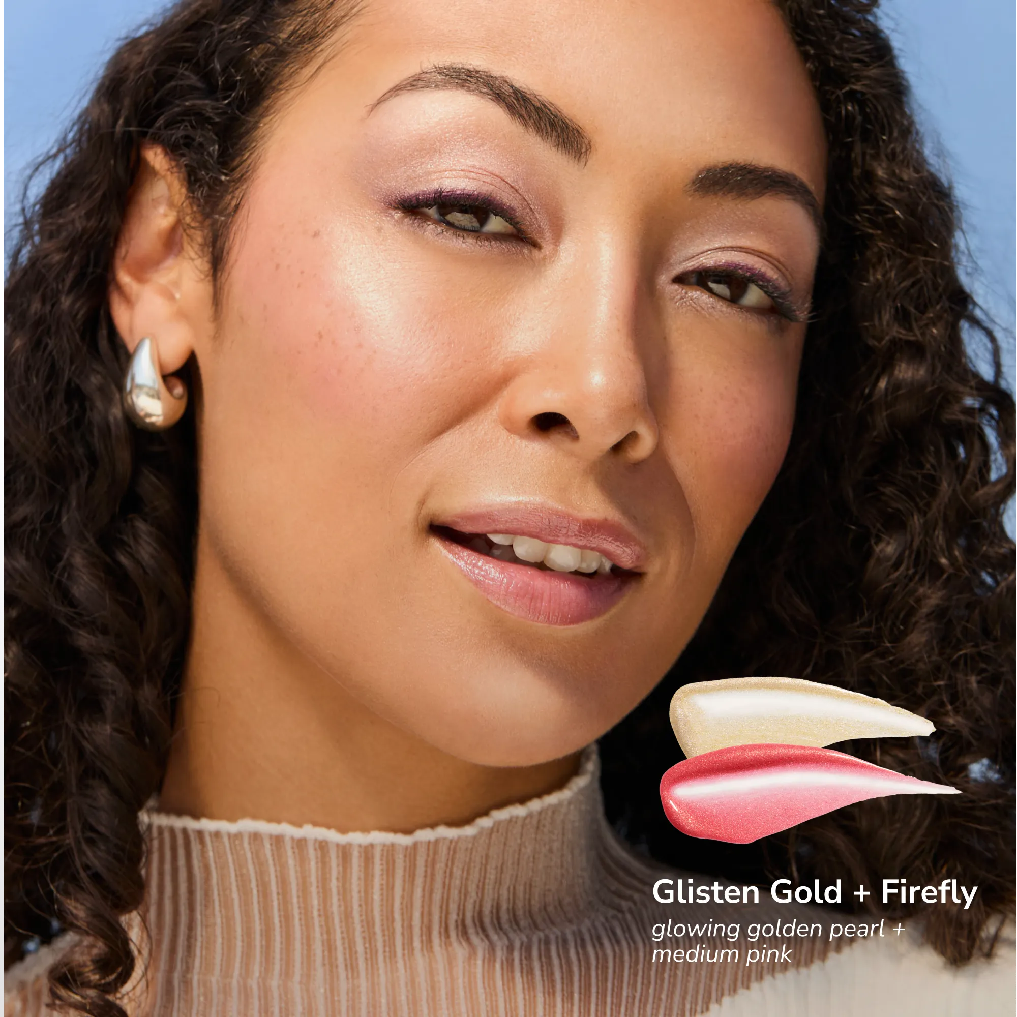 Model wearing Pearlizer Highlighter product shade Firefly