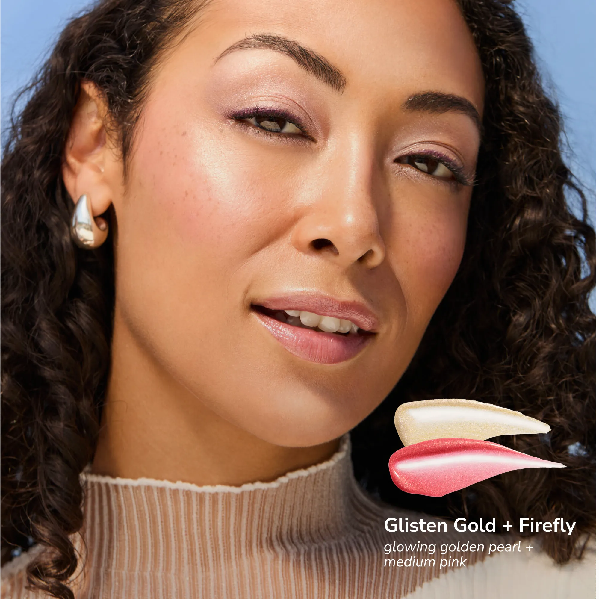Model wearing Pearlizer Highlighter product shade Glisten Gold