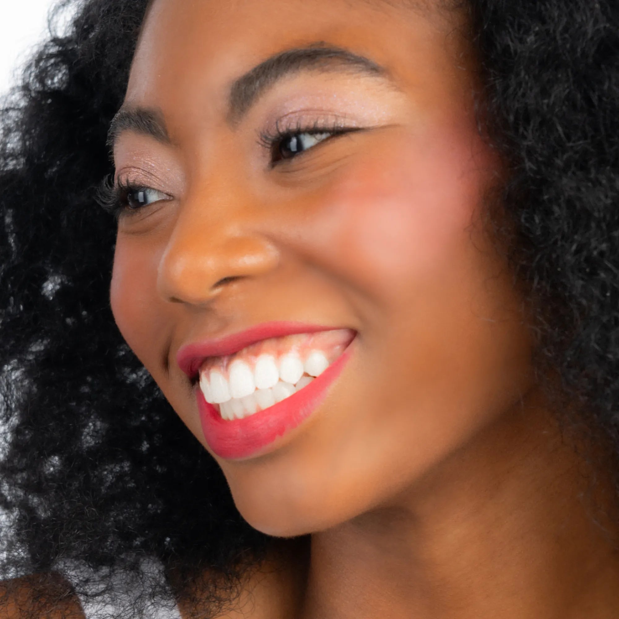 Model wearing ShadowSense product shade Dusk Shimmer