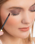 Model wearing ShadowSense product shade Garnet
